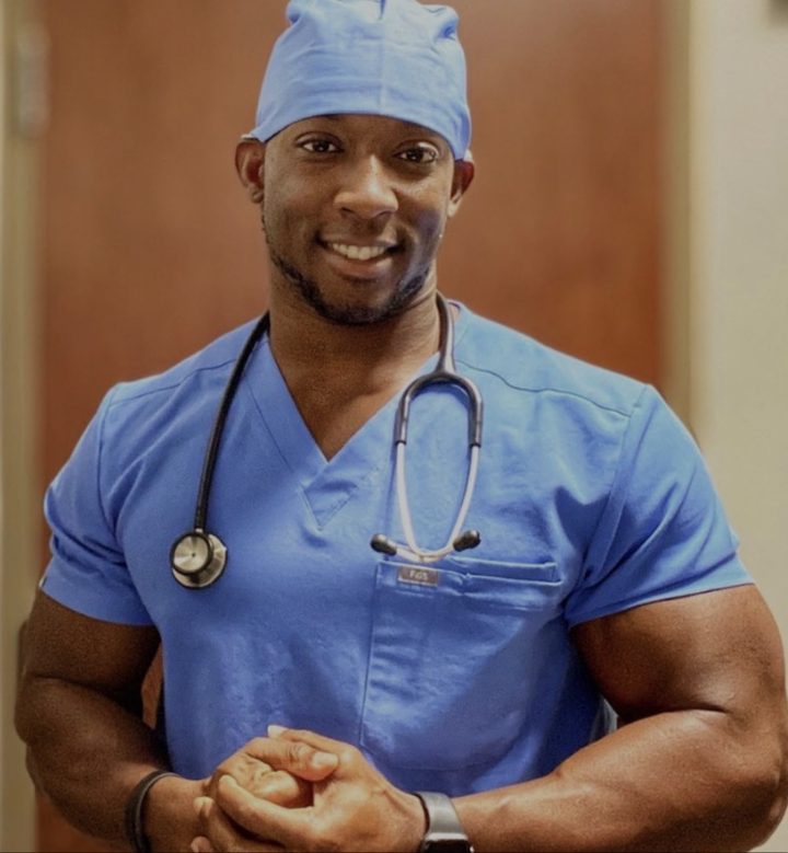 Dr. Emeka Ajufo in blue scrubs